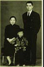 Chan with mom and dad